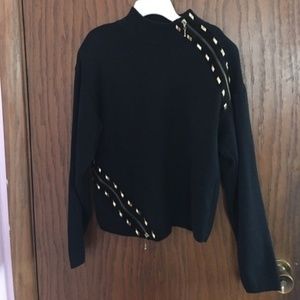 Black sweater with gold zippers